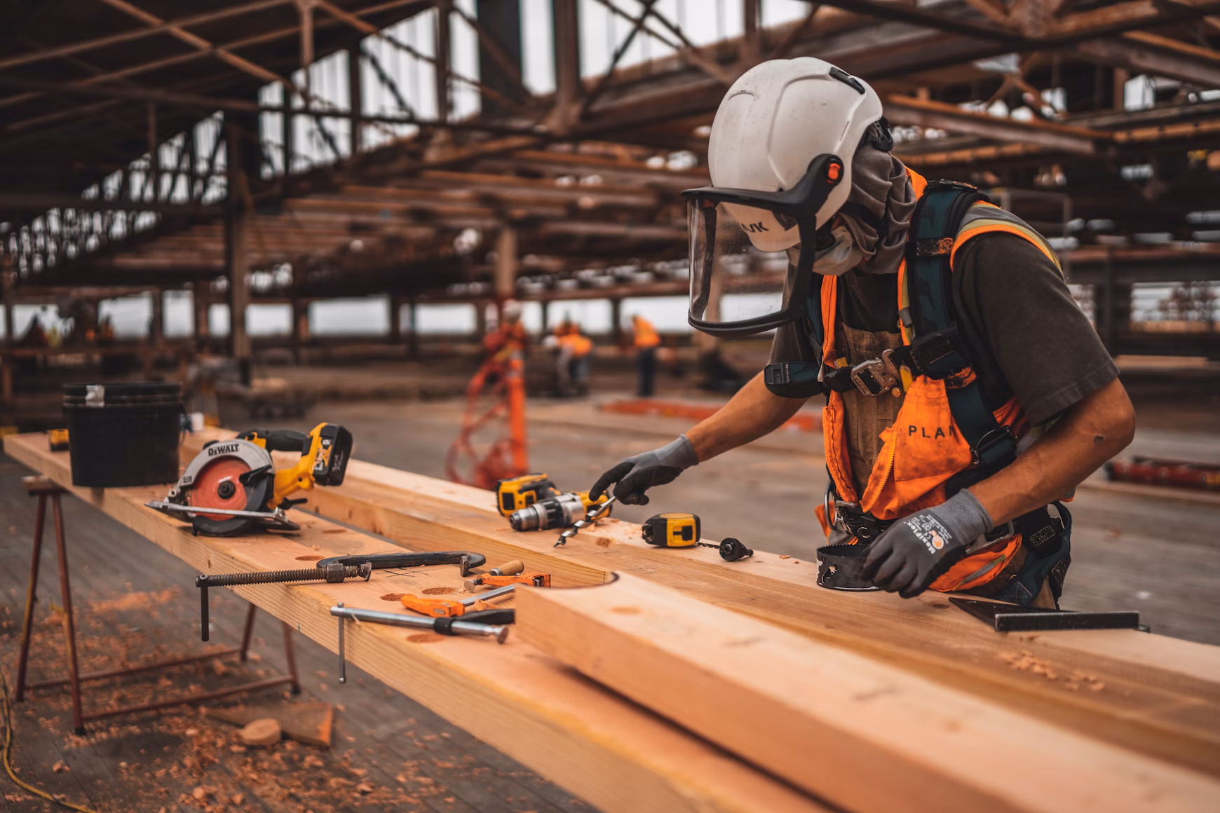A group of people in a construction site photo – Free Building Image on Unsplash